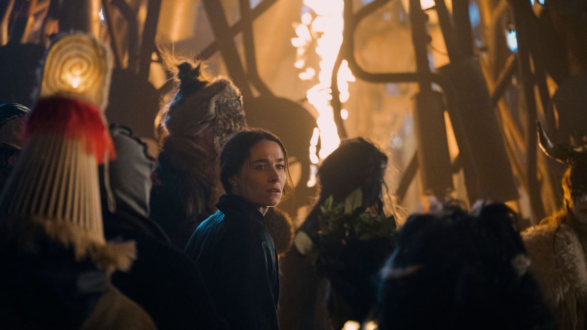 Dove (Siobhán Cullen) in the crowds during the Samhain festival in Bodkin episode 7/