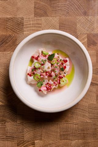 Long Island fluke crudo with pickled mandarinquat and mint