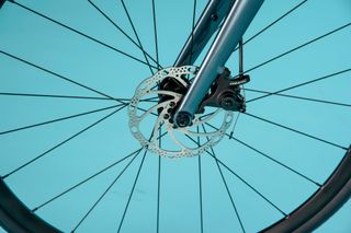 Vitus Razor Disc Road Bike Claris on a blue background