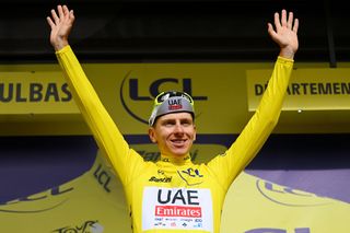 SAINT VULBAS FRANCE JULY 03 Tadej Pogacar of Slovenia and UAE Team Emirates celebrates at podium as Yellow Leader Jersey winner during the 111th Tour de France 2024 Stage 5 a 1774km stage from SaintJeandeMaurienne to Saint Vulbas UCIWT on July 03 2024 in Saint Vulbas France Photo by Dario BelingheriGetty Images