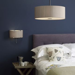Pendant light above bed and matching wall light