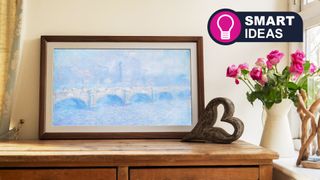 Vieunite Textura digital canvas on a sideboard displaying a famous painting