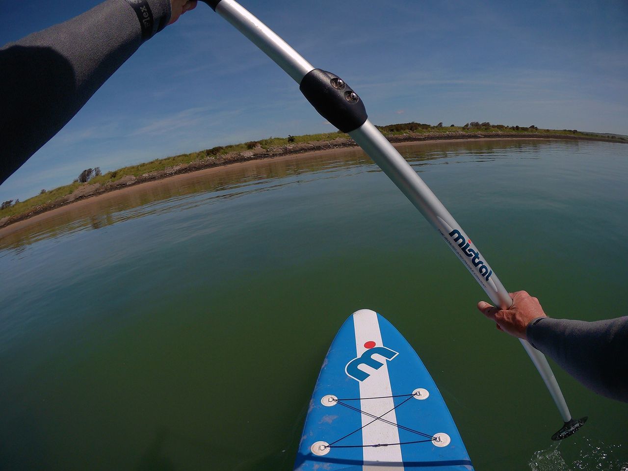 Still of a paddle boarder, captured using Olfi one.five Black action camera
