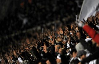 Besiktas fans cheer on their team in a derby against Fenerbahce in February 2011.