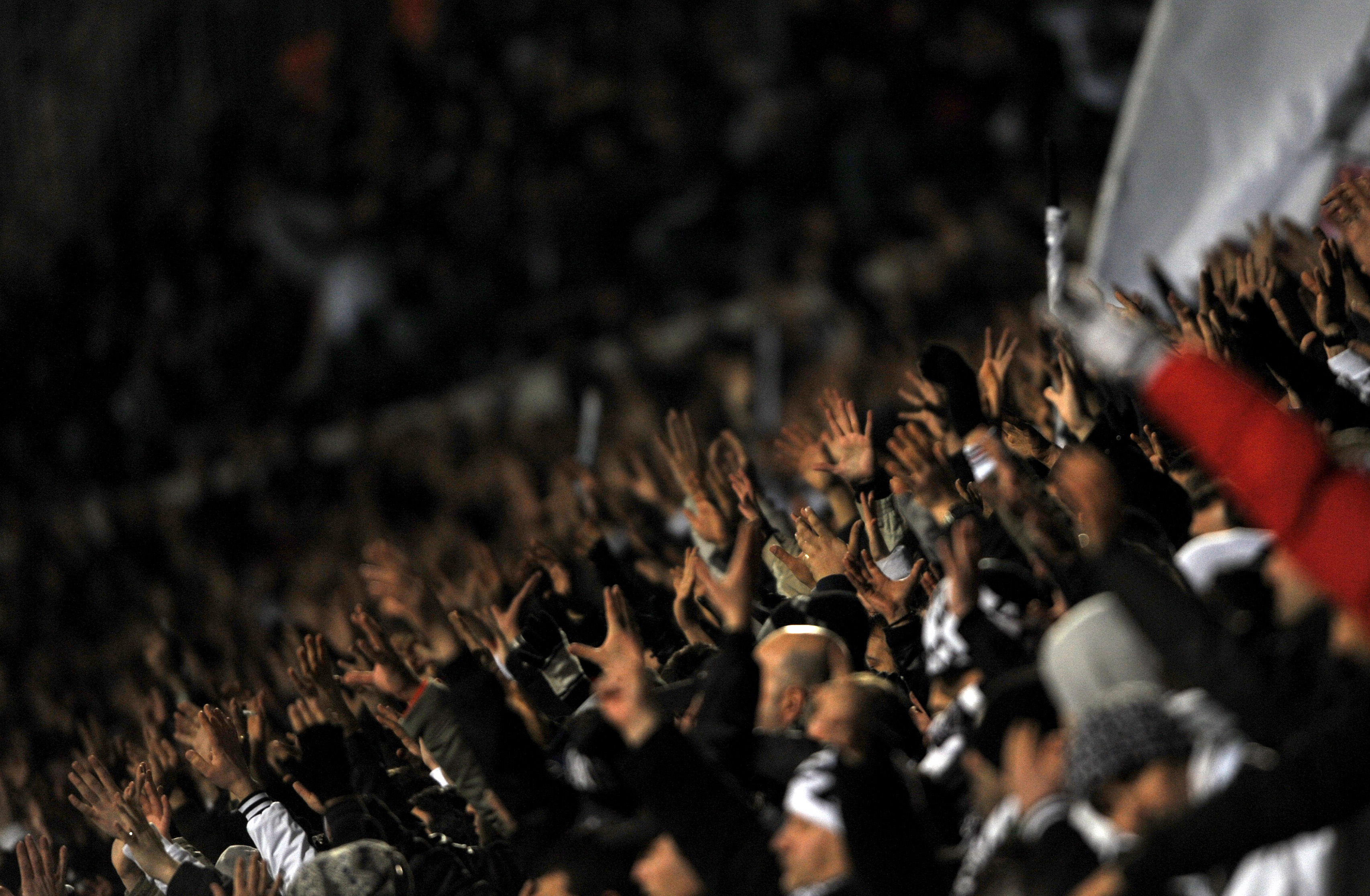 Besiktas fans cheer on their team in a derby against Fenerbahce in February 2011.