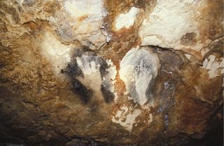 Hand prints in Cosquer Cave in France.