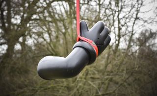 A disembodied arm from one of KAWS’ sculptures