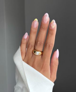 a pastel French tip manicure design