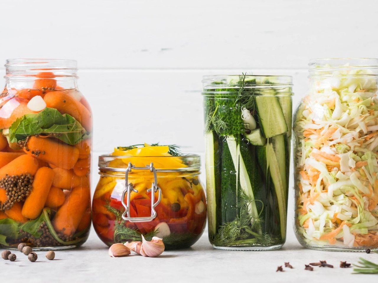 Several jars of pickled vegetables