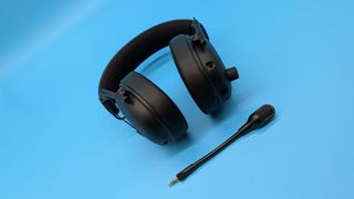 Razer BlackShark V3 gaming headset on a blue blackground