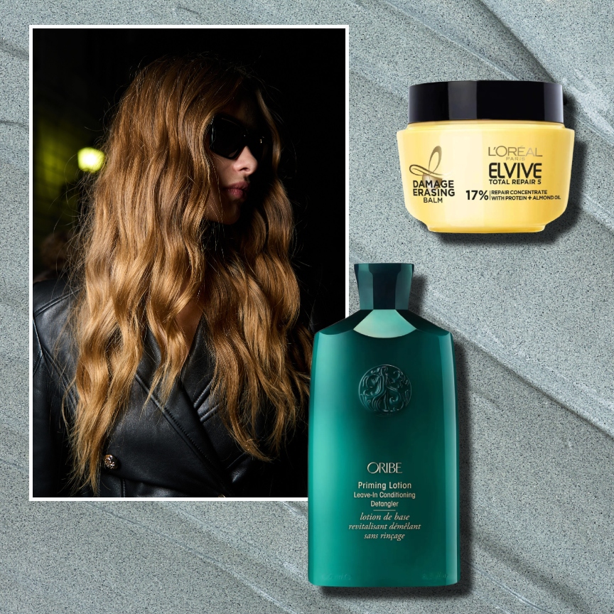 a woman with brown wavy hair and sunglasses on a slate green background with two bottles of leave-in conditioner