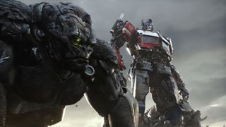 (L to R) Optimus Primal and Optimus Prime in the nTransformers 7: Rise of the Beasts trailer