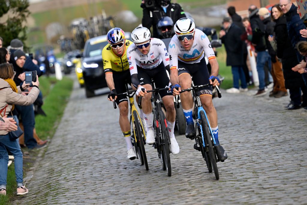 The podium trio – Oier Lazkano leads Tim Wellens and Wout van Aert over the cobbles of Kuurne-Brussel-Kuurne