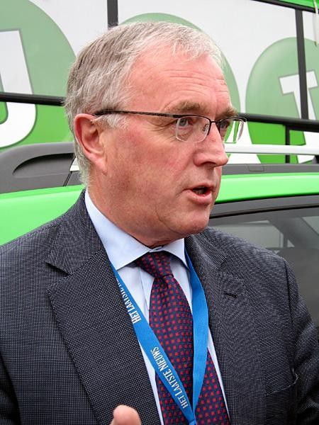 McQuaid explains to the media his problems with the Grand Tours.