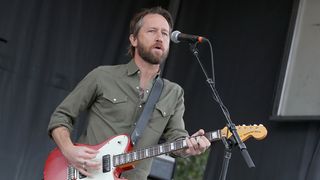 Chris Shiflett performing live on stage in 2020