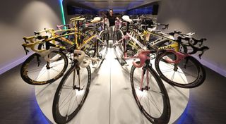 12 bikes are placed on a platform at the end of the room