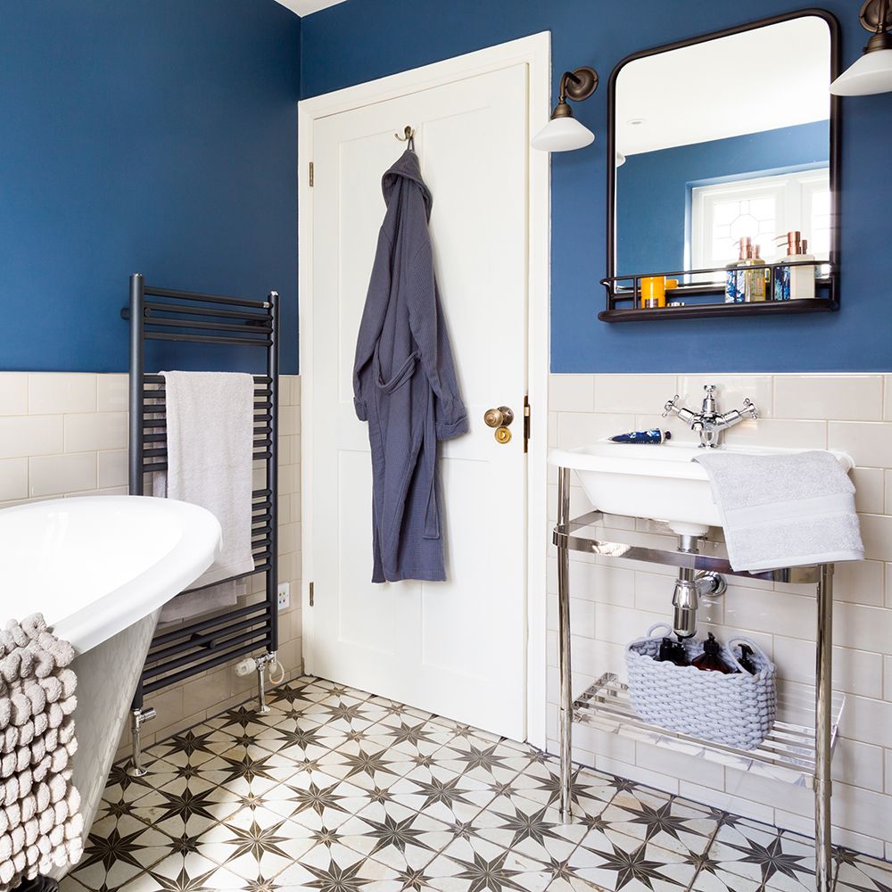 Traditional bathroom makeover with roll top bath, blue walls and star ...