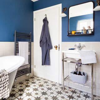 bathroom with blue wall and star tiles