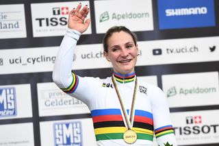 Gold medalist Germany's Kristina Vogel celebrates on the podium after taking part in the women's sprint final during the UCI Track Cycling World Championships