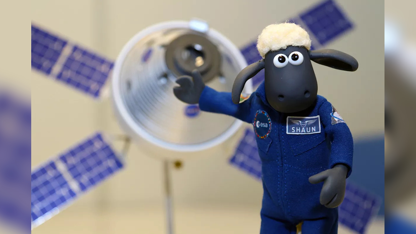 Shaun the sheep in a blue space suit
