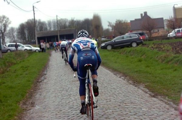 A Katusha rider on the cobbles.