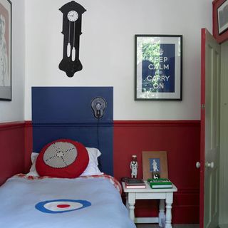 kids bedroom with red and blue painted walls