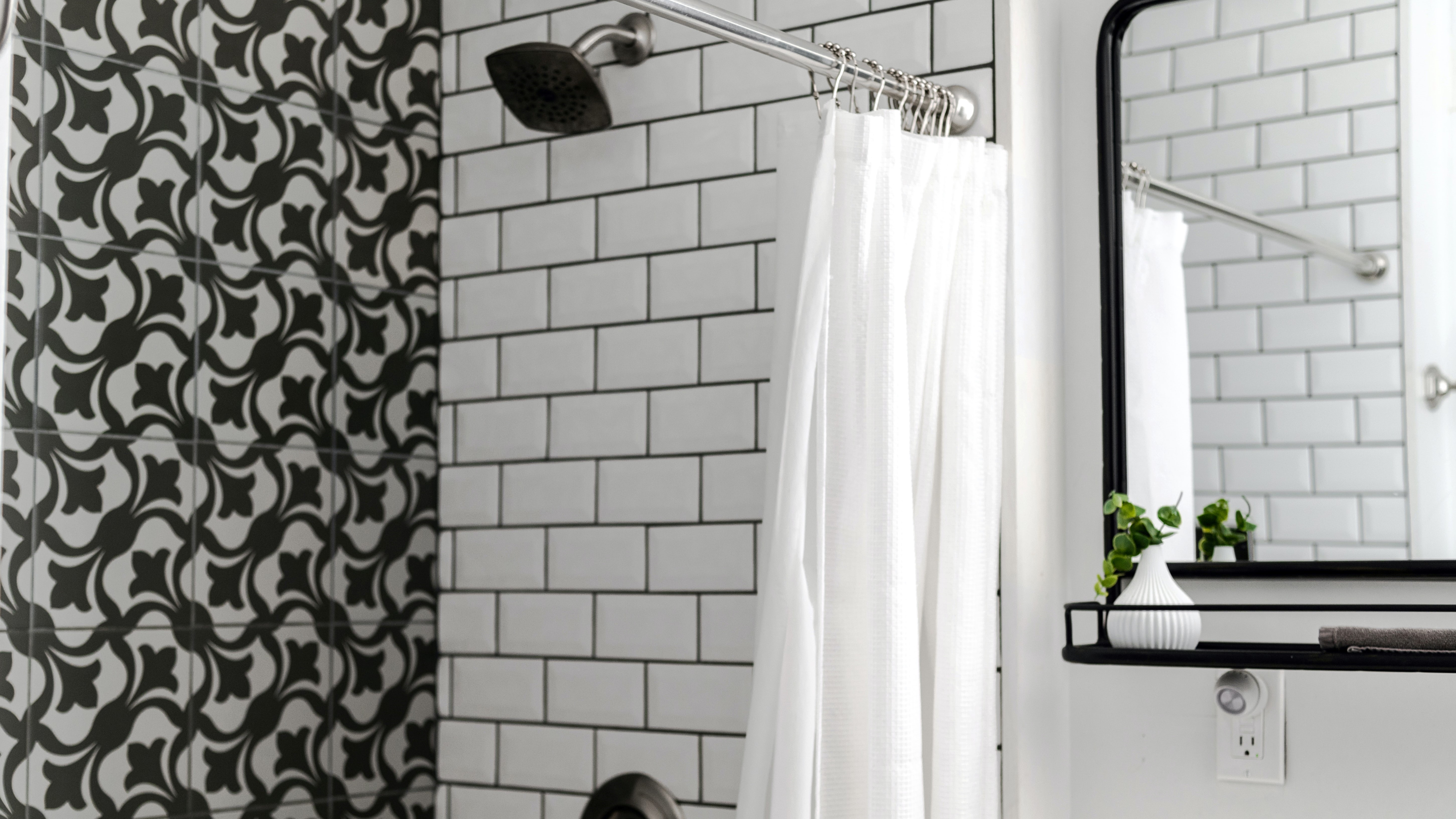 Black and white shower with curtain