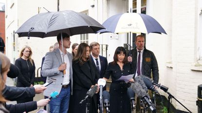 The mother of Royal Artillery Gunner Jaysley Beck, Leighann McCready (second right) speaking to the media outside the Wiltshire and Swindon Coroner's Court