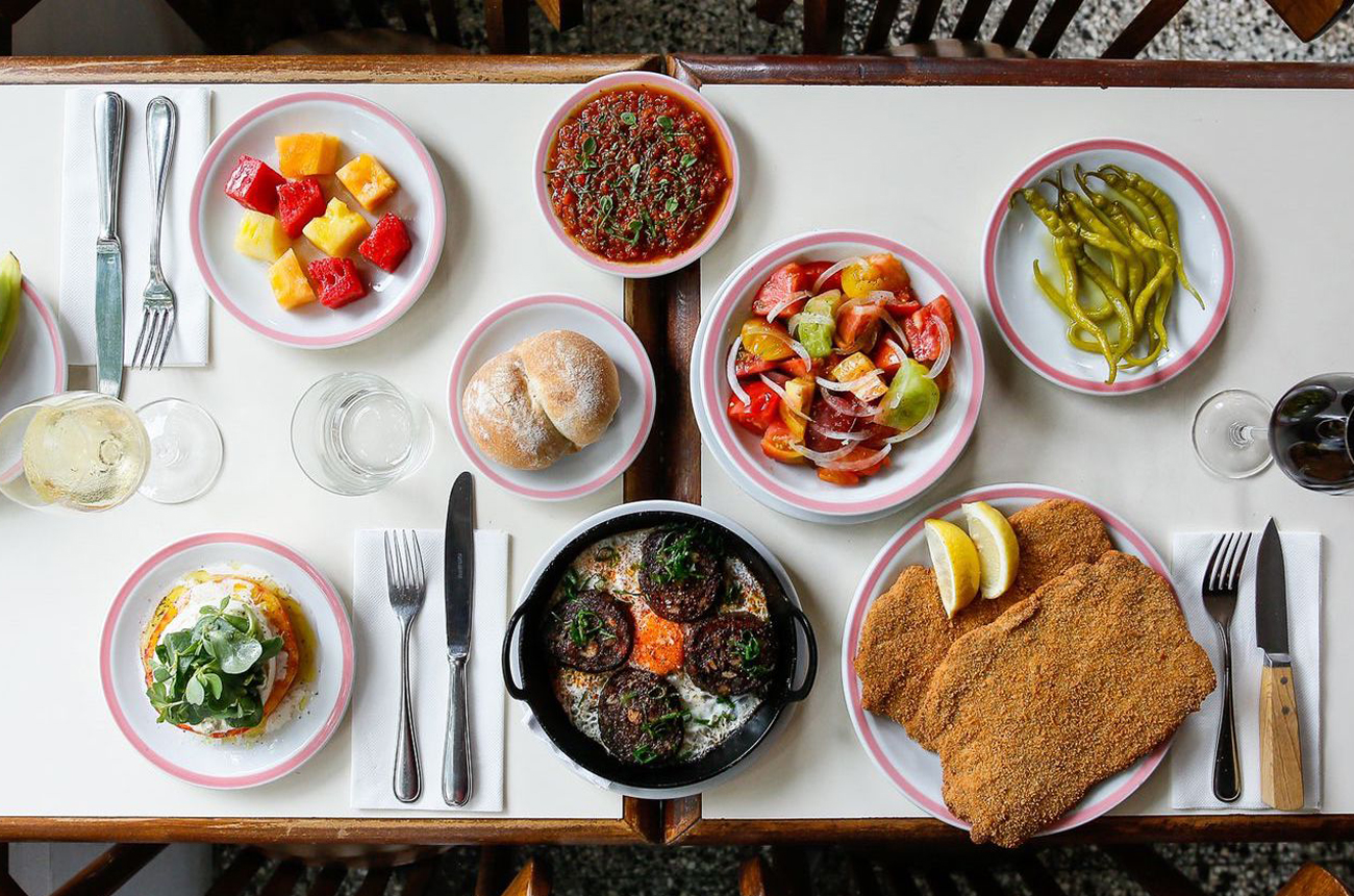 A. table of plates of food