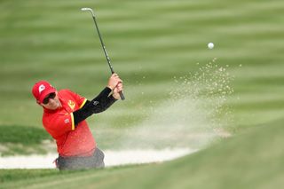 Sergio Garcia plays a bunker shot on LIV Golf