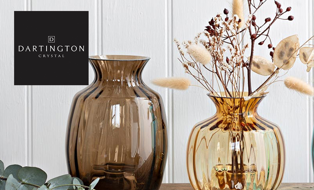 Two autumnal colour glass vases with dartington crystal logo in top left corner 