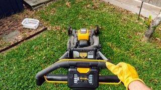 Dewalt DCMWP600X2 60V MAX Cordless Push Mower being tested in writer's home