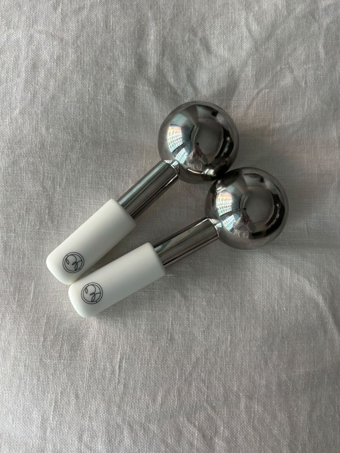 The ESPA Cryotherapy Globes on a white linen background