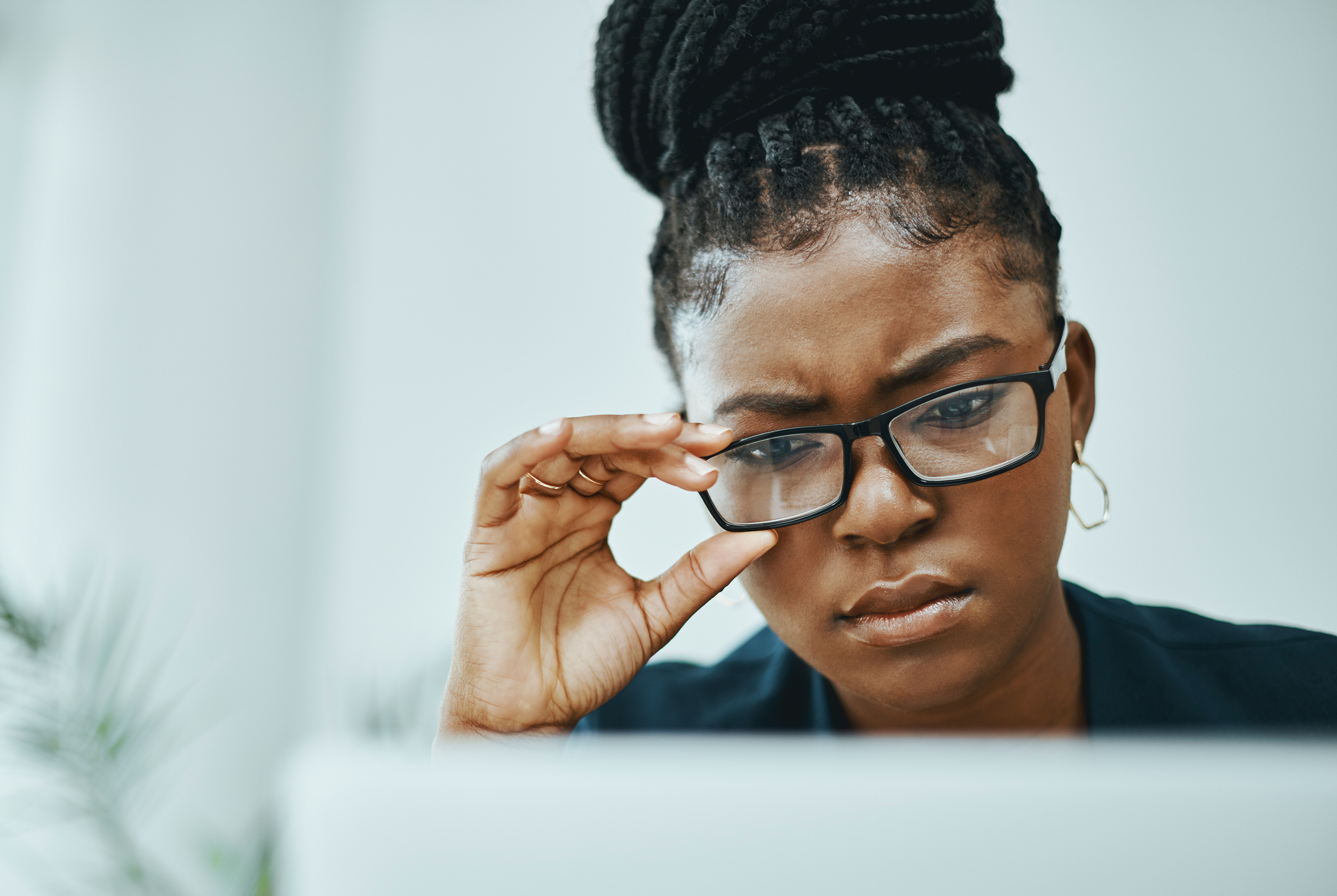Woman looking at computer.