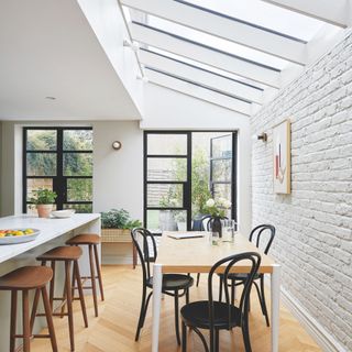 Light-filled side return extension with kitchen and dining area and rooflights overhead