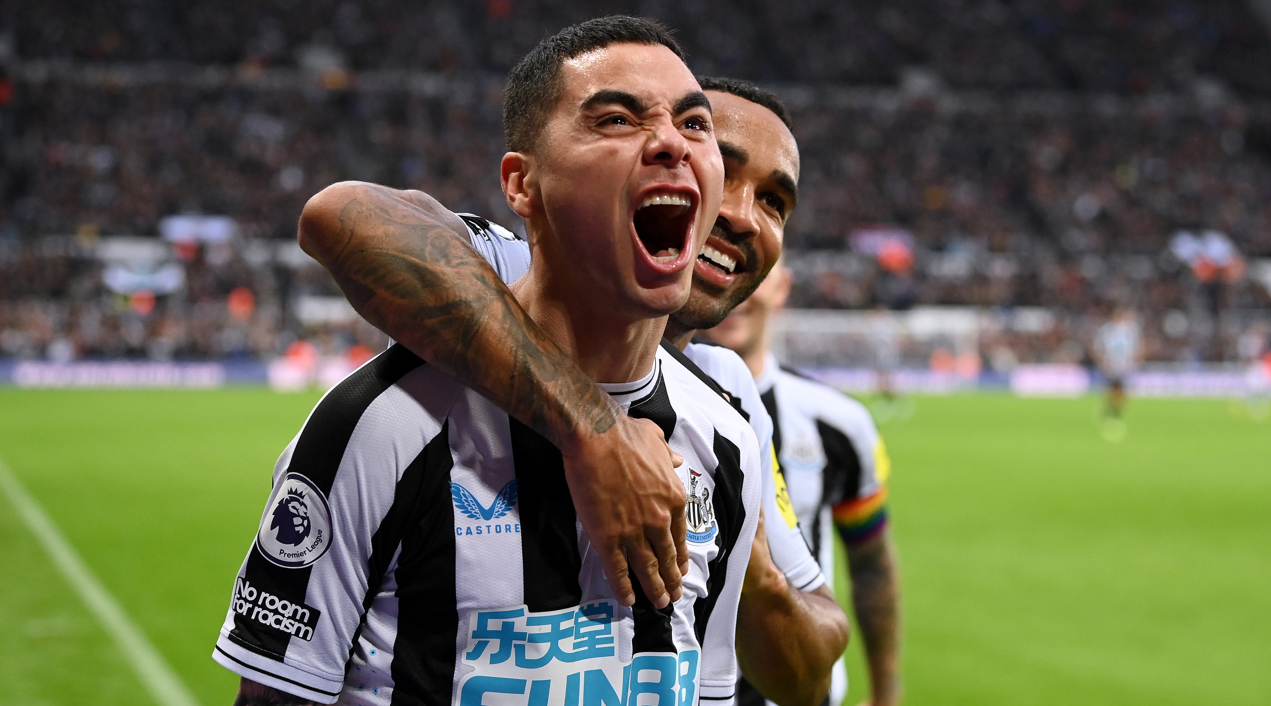 Newcastle forward Miguel Almiron celebrates with teammate Callum Wilson after scoring his team's fourth goal in the Premier League match between Newcastle United and Aston Villa on 29 October, 2022 at St. James' Park, Newcastle, United Kingdom