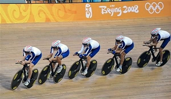 All warmed up: Great Britain's track team hits the Laoshan Velodrome.