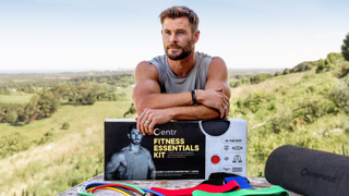 a photo of Chris Hemsworth with resistance band kit