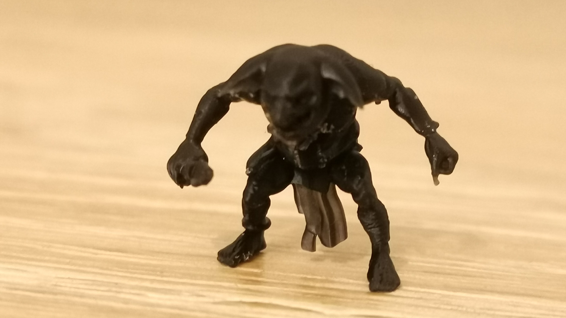 A tiny printed goblin figurine from the Elegoo Saturn