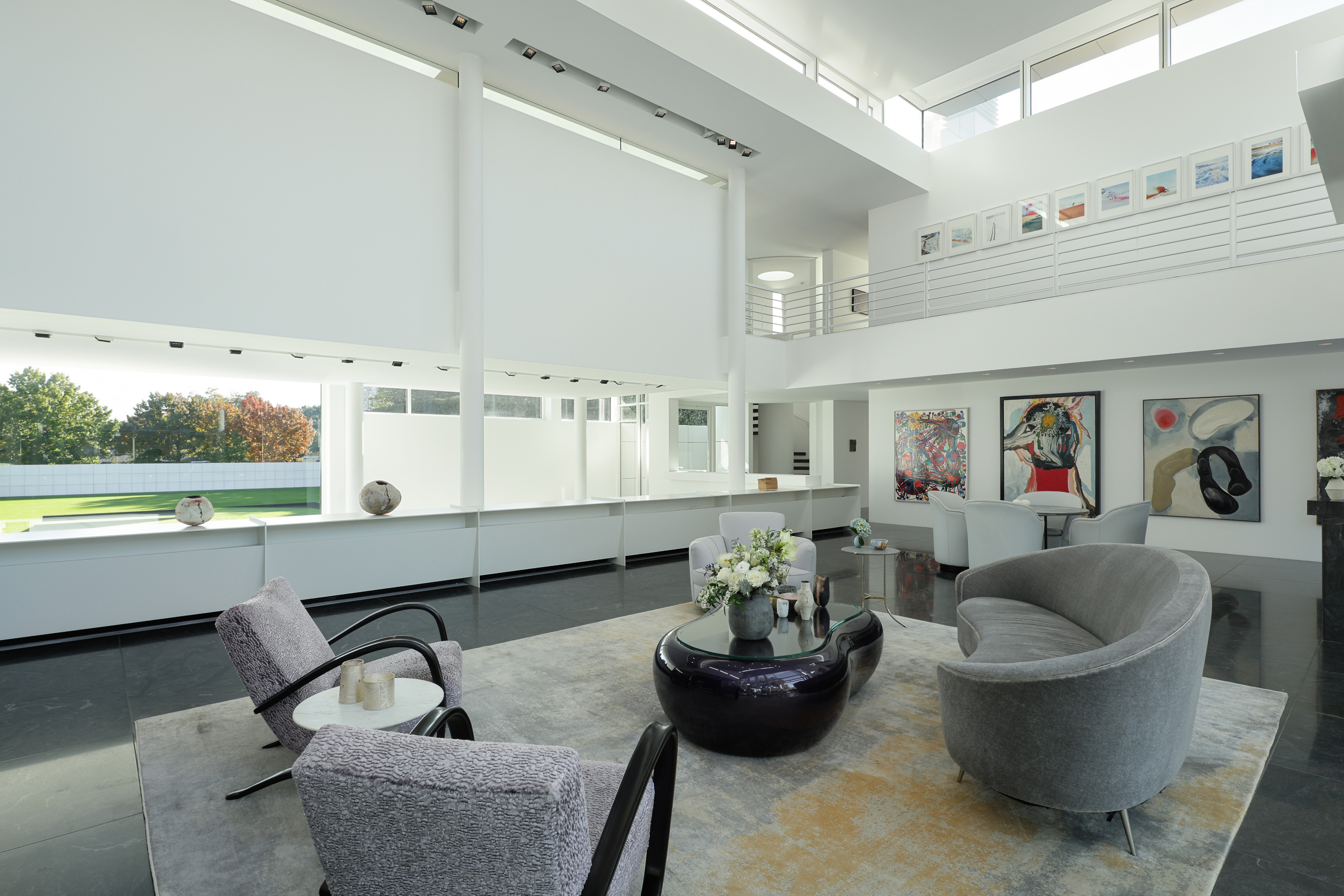 The formal living spaces overlook the grounds