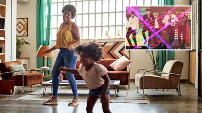 Woman and child dancing in their living room, with an inset of the South Korean boyband BTS