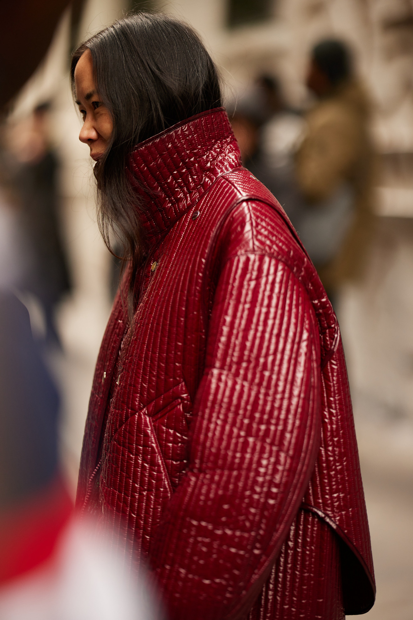 woman wearing a red coat in new york