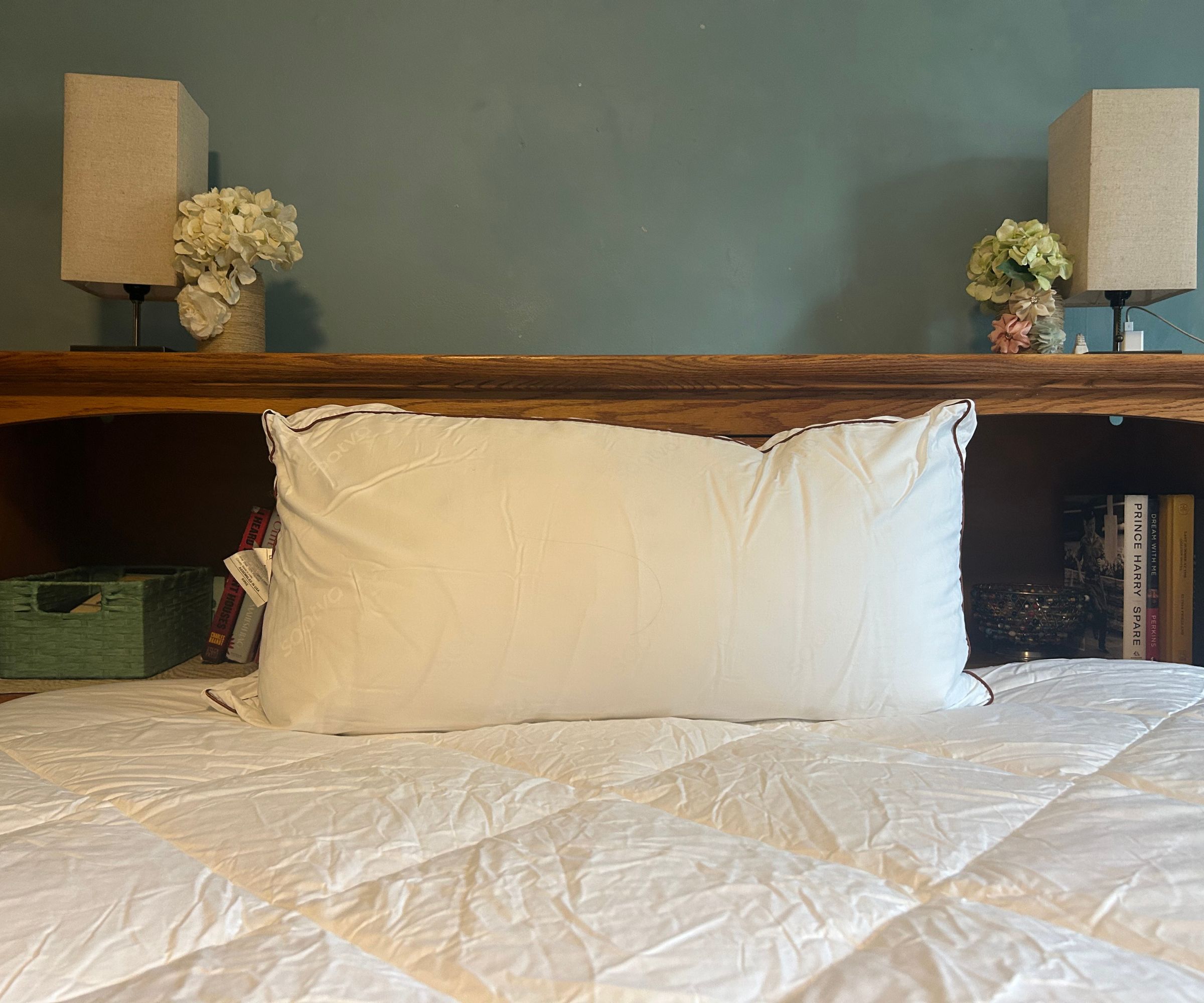 Images of the Saatva Latex pillow close up and from the side to demonstrate testing for a review