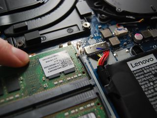 Press down on the RAM so it clicks into place