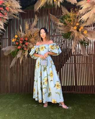 @aimeesong wearing a floral dress