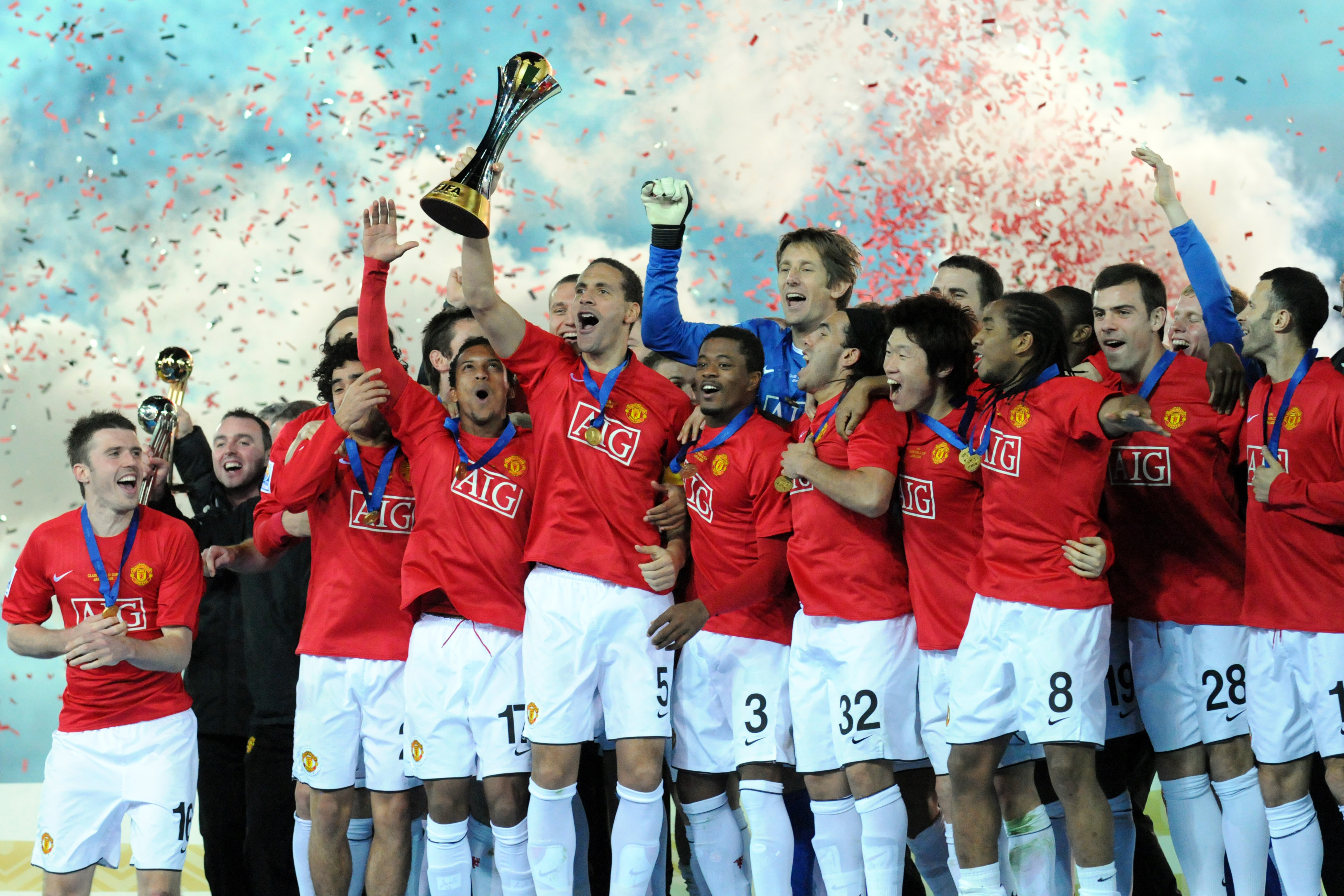 Manchester United players celebrate after beating LDU Quito to win the FIFA Club World Cup in December 2008.