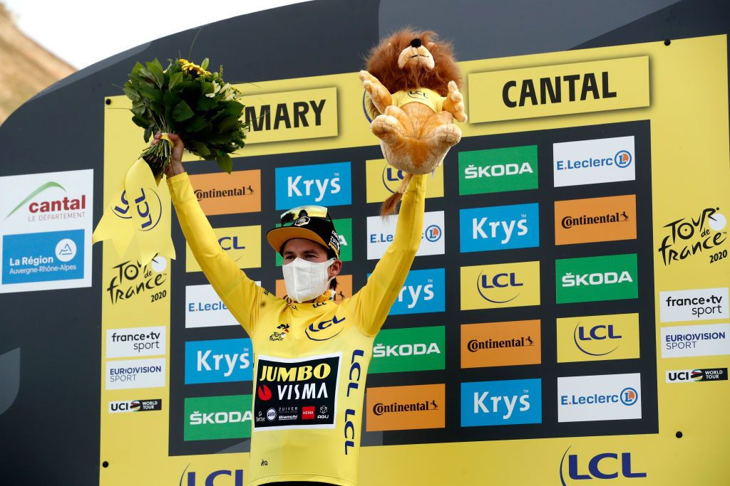 CANTAL FRANCE SEPTEMBER 11 Podium Primoz Roglic of Slovenia and Team Jumbo Visma Yellow Leader Jersey Celebration Lion Mascot Trophy during the 107th Tour de France 2020 Stage 13 a 1915km stage from ChtelGuyon to Pas de PeyrolLe Puy Mary Cantal 1589m TDF2020 LeTour on September 11 2020 in Cantal France Photo by Benoit Tessier PoolGetty Images
