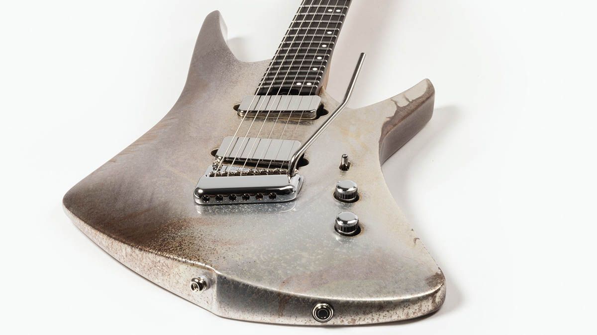 The Ernie Ball Music Man Kaizen Gallium has a custom aged metallic finish, making Tosin Abasi's signature electric guitar look like an alien artefact