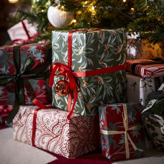 wrapped presents under a tree