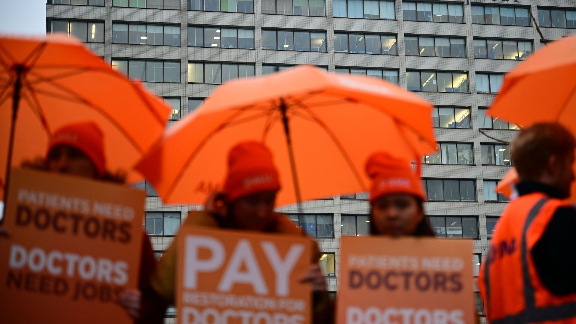 Doctors striking outside St Thomas Hospital in London
